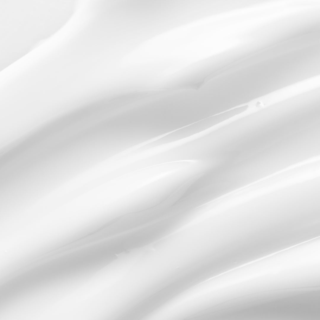 Close up of a milky white liquid.