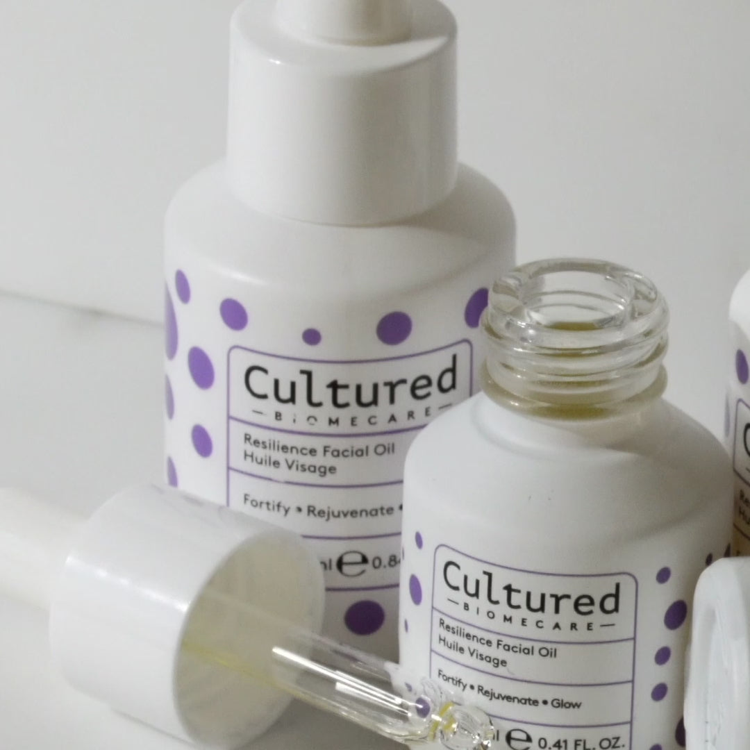 A close up video to showcase Resilience Face Oil bottle and content - yellow clear liquid.